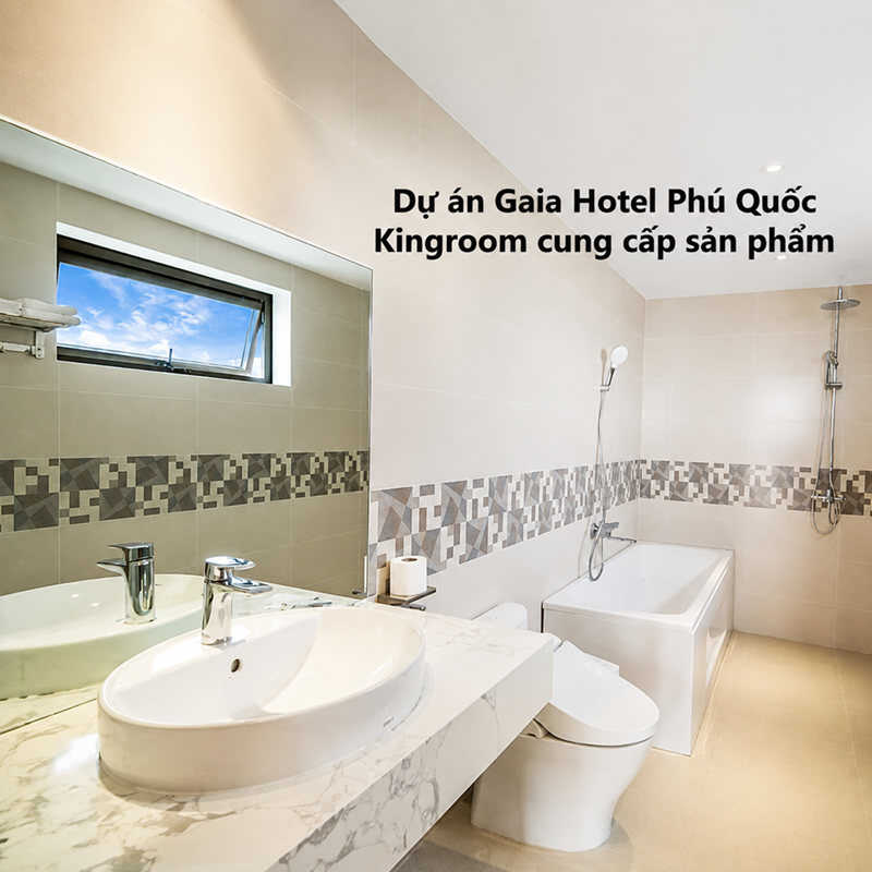 Khu vực lavabo, bồn cầu và bồn tắm tại Gaia Hotel Phú Quốc.