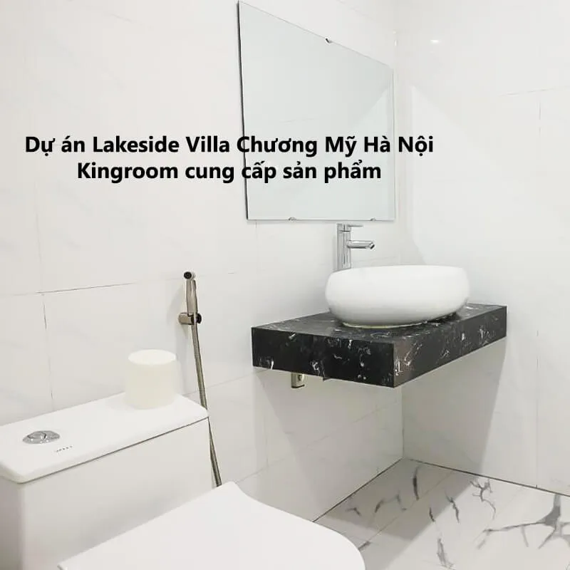 Phòng tắm hiện đại với lavabo tròn tại Lakeside Villa Chương Mỹ Hà Nội.