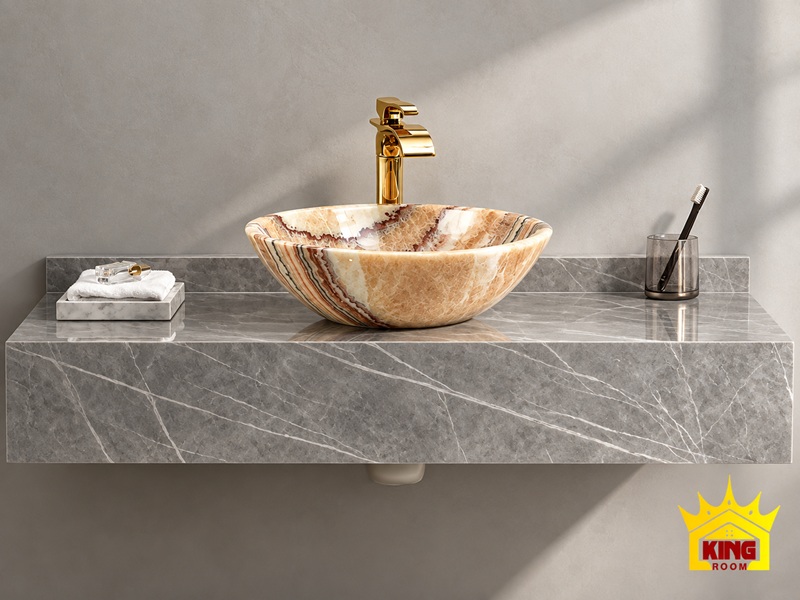 Chậu lavabo đá DS10 trong ảnh phối cùng mặt bàn và vòi.