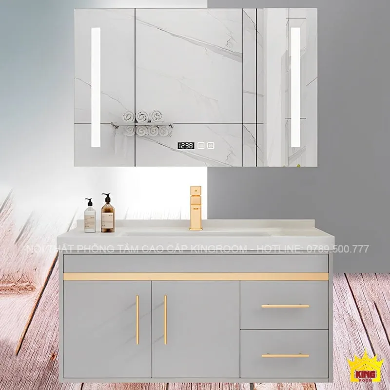 Chiếc tủ lavabo hiện đại NA7 làm từ Inox 304, với bề mặt màu xám và tay nắm màu vàng