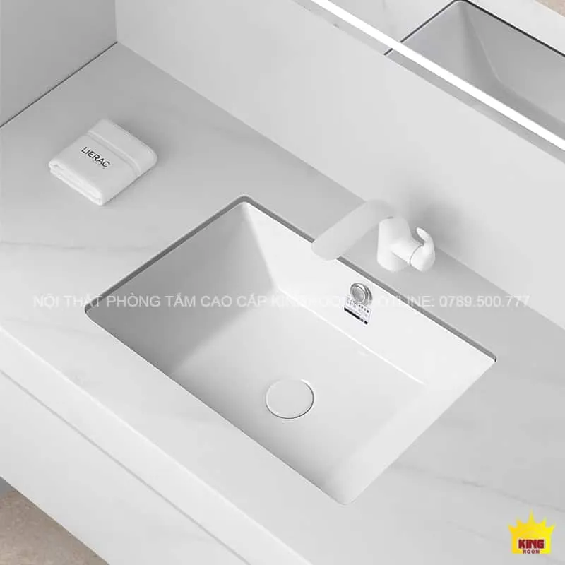 Lavabo Âm Bàn Aqua SR20 màu trắng với thiết kế hiện đại và tinh tế, được lắp đặt trong phòng tắm cao cấp.