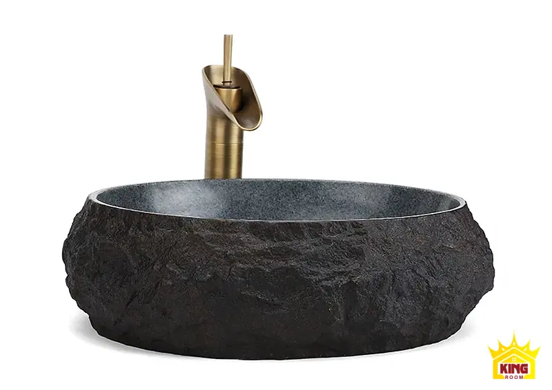 Chậu đá cuội đặt bàn phối vòi màu đồng Chậu lavabo đá cuội oval xám đen phối vòi tông đồng trên nền trắng