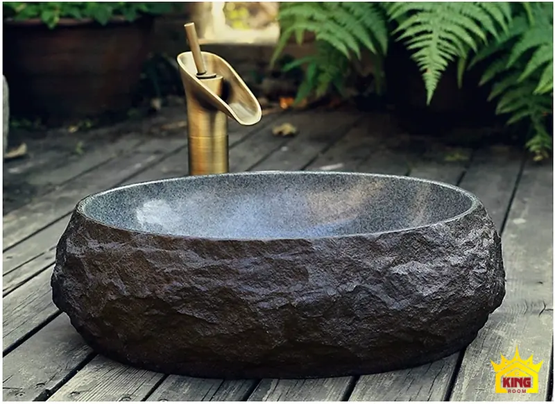 Mặt trước chậu đá cuội oval đặt bàn Mặt trước lavabo đá cuội oval xám đen với thành ngoài thô mộc