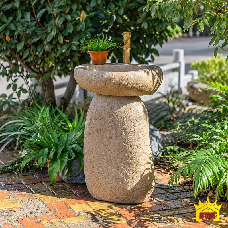 Thân chân đế và vùng tiếp xúc với nền Bộ lavabo đá cuội với thân chân đế thuôn bo, chậu oval phía trên và phần chân tiếp xúc nền