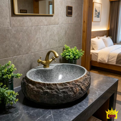 Chậu oval phối mặt bàn tối, tường gạch và cây xanh