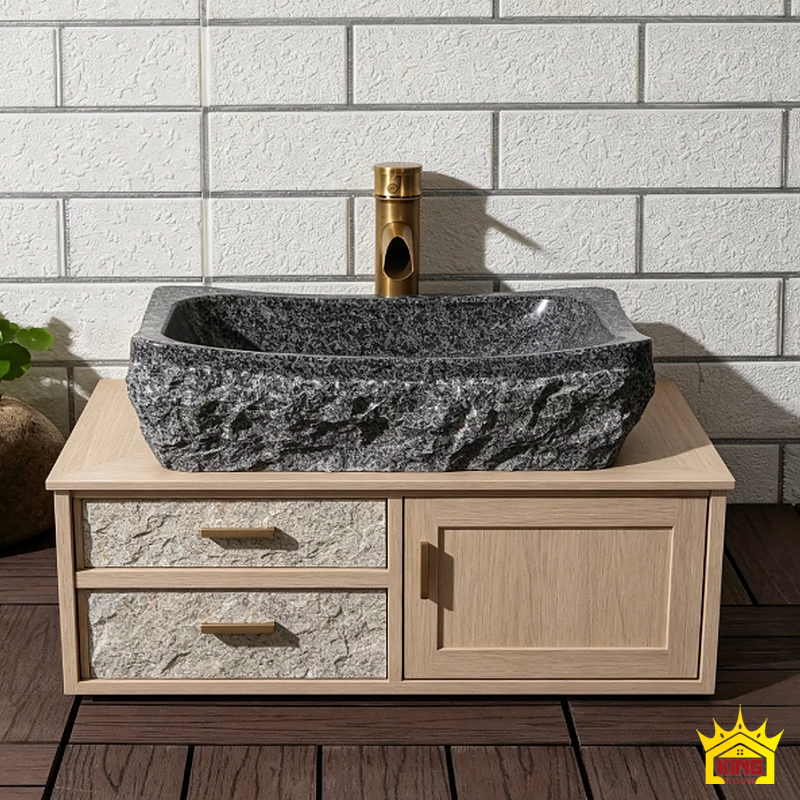 Chậu đá xám đặt trên tủ gỗ có cánh và ngăn kéo